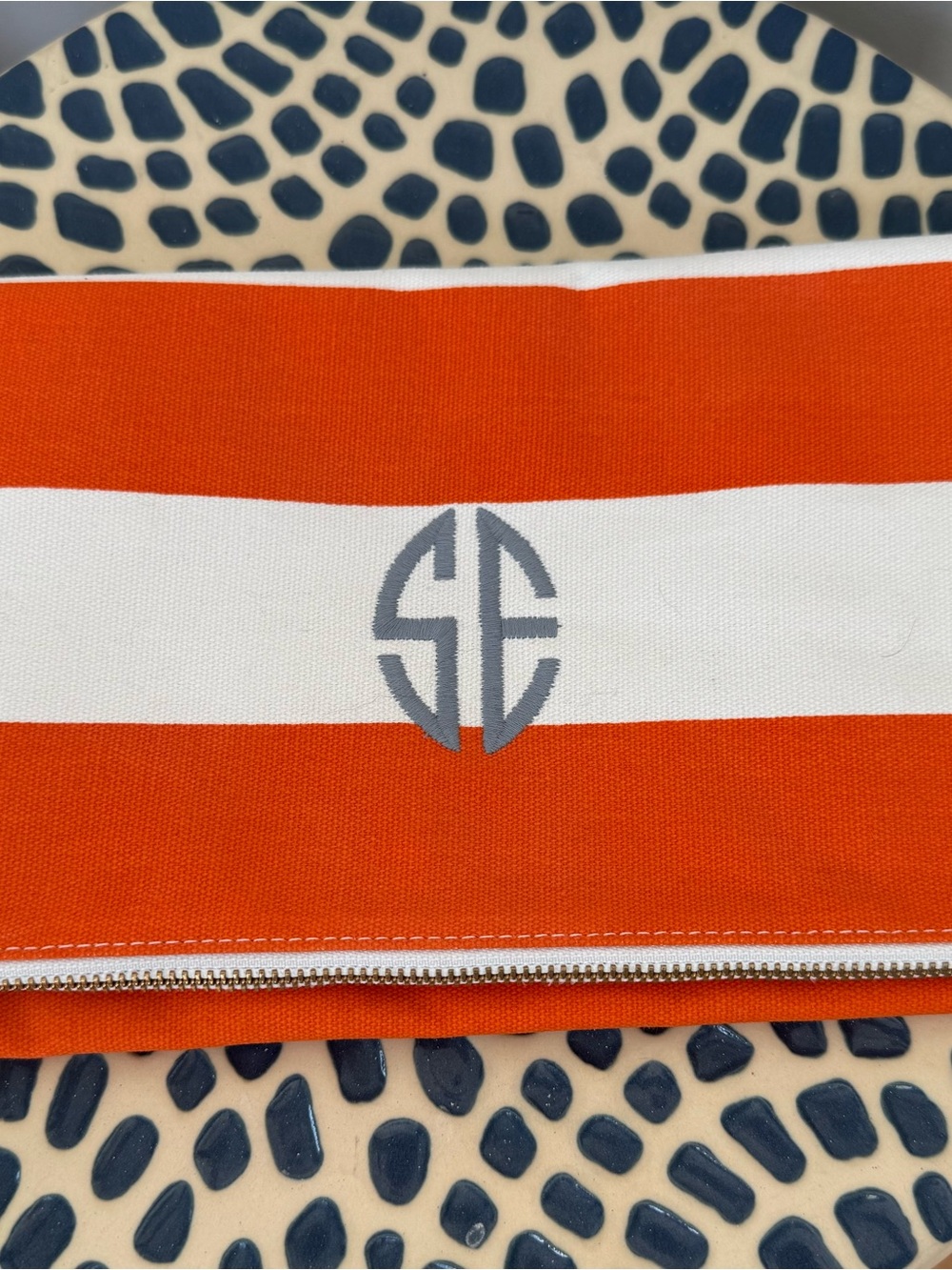 Mark & Graham Striped Orange & White Fold Over Zip Clutch with Monogram “SE”